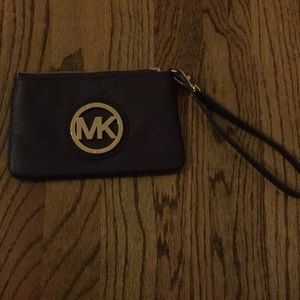 Purple Michael kors wristlet
